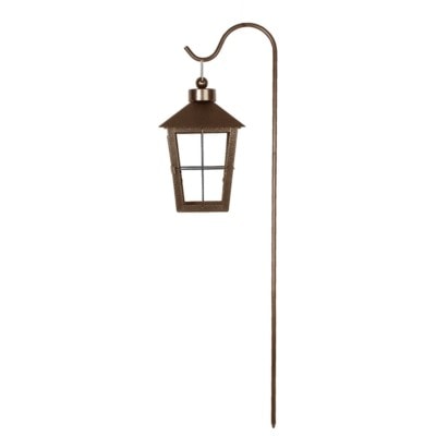 Gravlykta hängande på krok brun